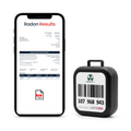 Radon monitoring report open on a phone beside the Essential alpha-track detector, showing the measurement period and the result in becquerels per cubic metre, with a downloadable PDF