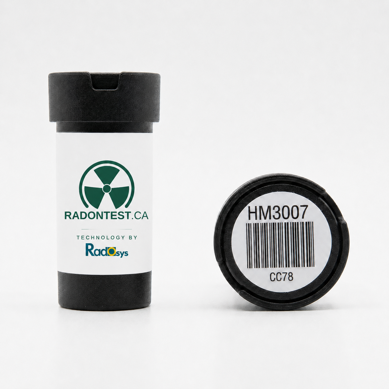 Close-up of the RadonTest.ca alpha-track radon detector and its barcoded serial-number label
