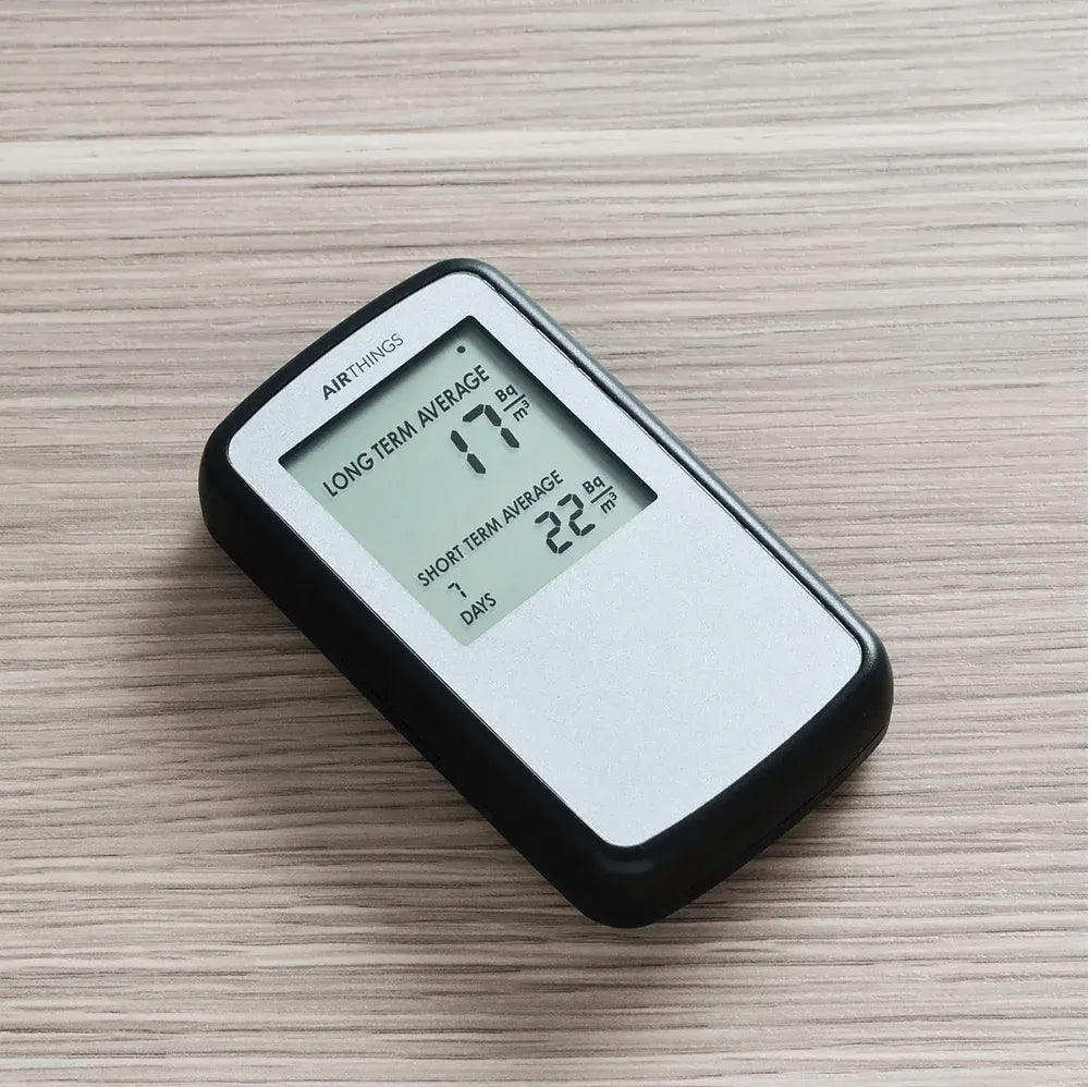 Corentium Home digital radon monitor placed flat in a living area